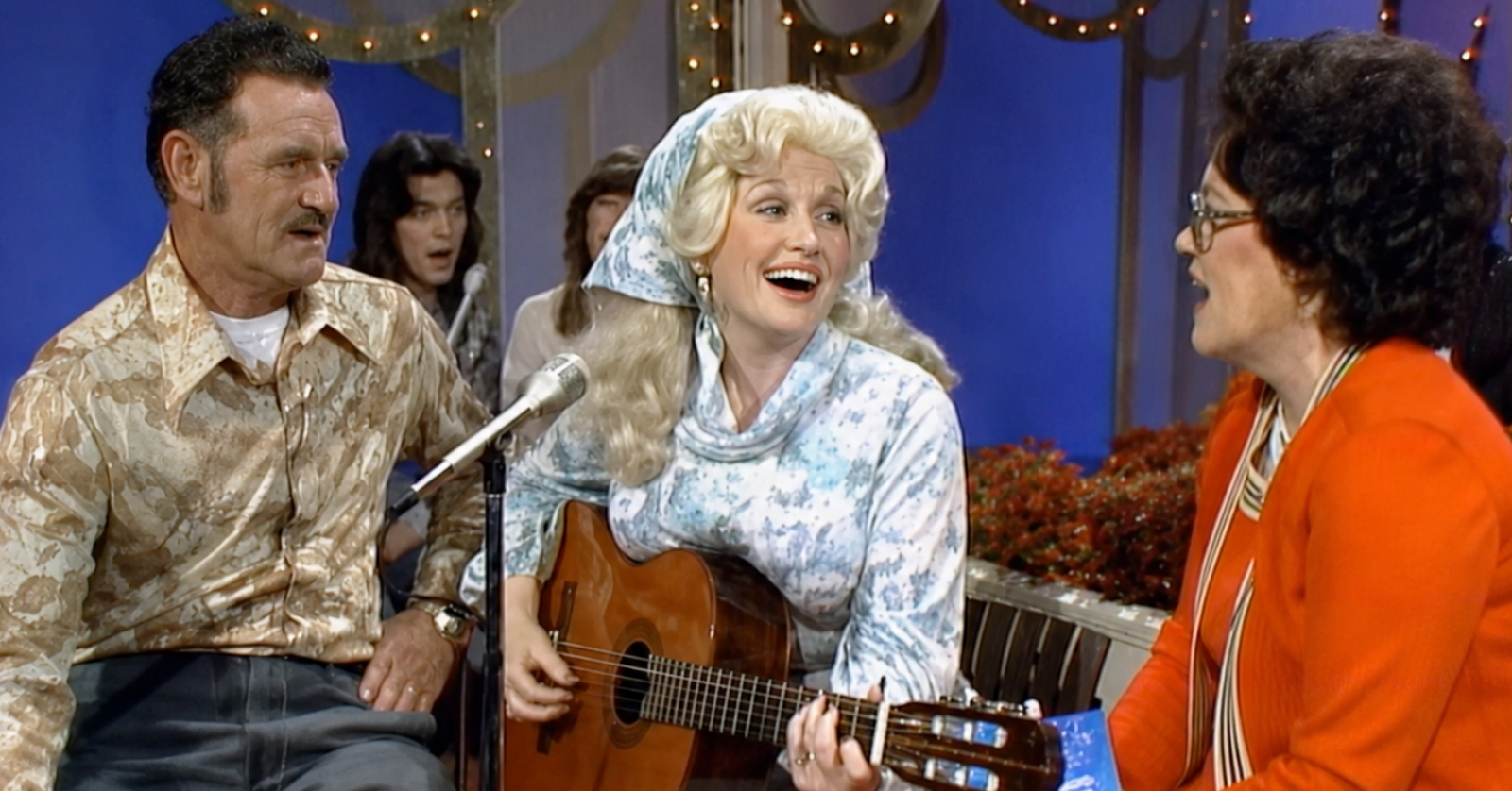 Dolly Parton sings with her mom, Avie Lee, and dad, Robert Lee, on her TV show in the 1970s