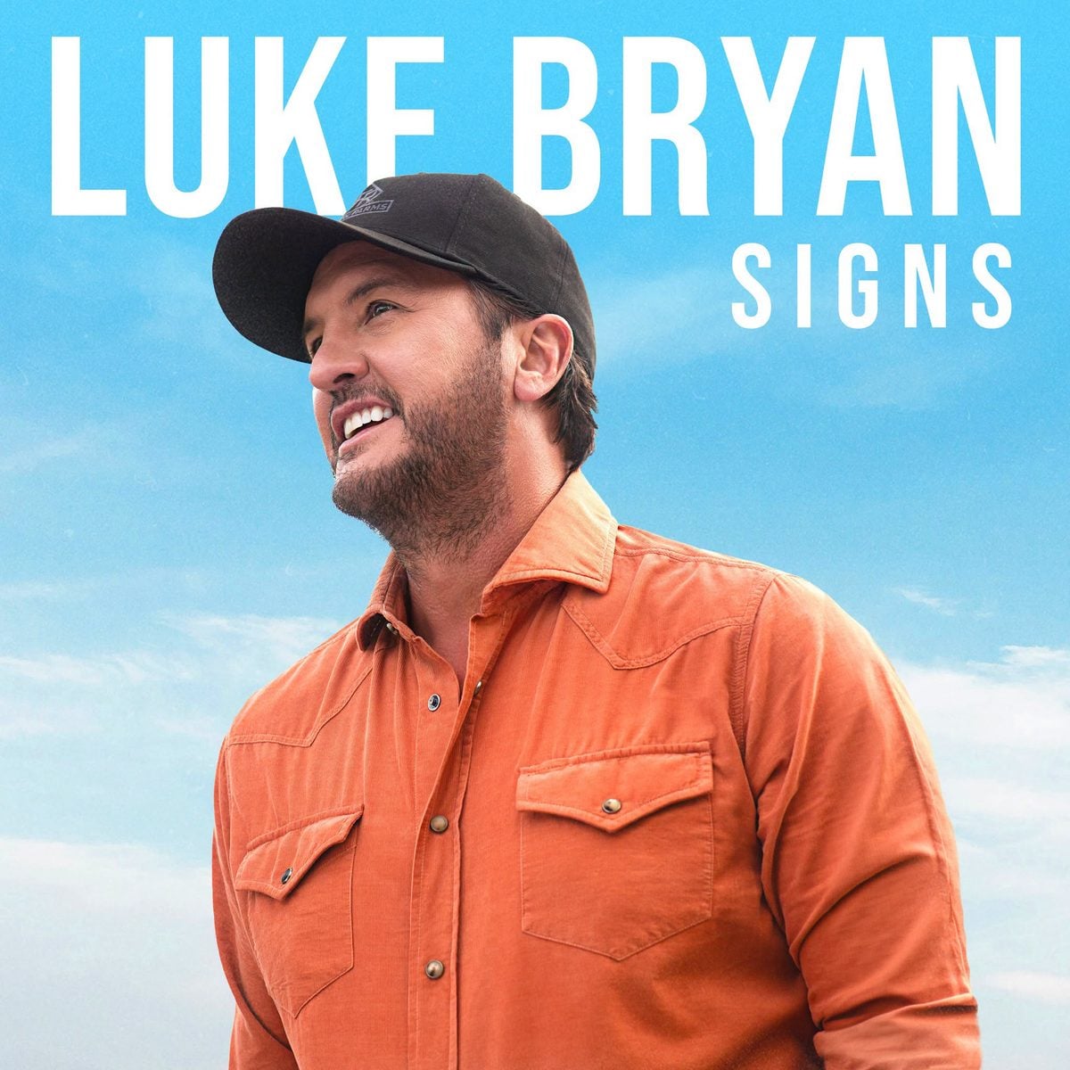 luke bryan signs album cover 
