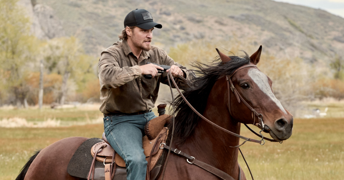Luke Grimes rides a horse in a scene from Season 2 of the Yellowstone spin-off Marshals, he is the actor who plays Kayce Dutton
