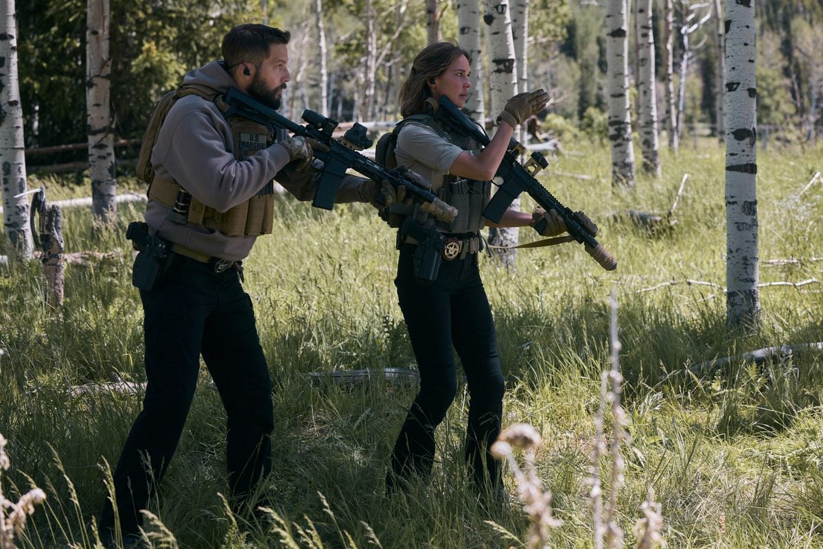 "Falling Sky" -- Coverage of the CBS Original Series Marshals, scheduled to air on the CBS Television Network. Pictured (L-R): Logan Marshall-Green as Pete Calvin and Arielle Kebbel as Belle. Photo: Fred Hayes/CBS ©2026 CBS Broadcasting, Inc. All Rights Reserved.