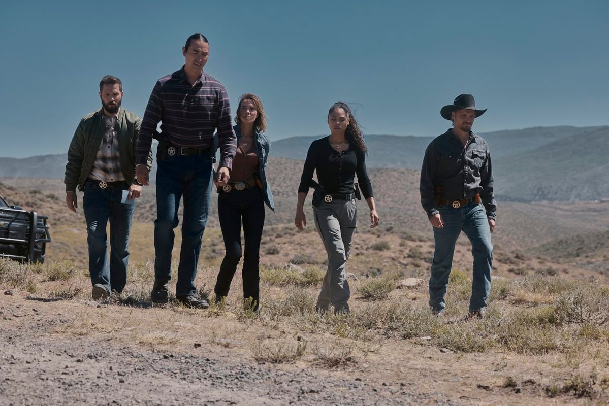 "Falling Sky" -- Coverage of the CBS Original Series Marshals, scheduled to air on the CBS Television Network. Pictured (L-R): Logan Marshall-Green as Pete Calvin, Tatanka Means as Miles Kittle, Arielle Kebbel as Belle Skinner, Ash Santos as Andrea Cruz, and Luke Grimes as Kayce Dutton. Photo: Fred Hayes/CBS ©2026 CBS Broadcasting, Inc. All Rights Reserved.