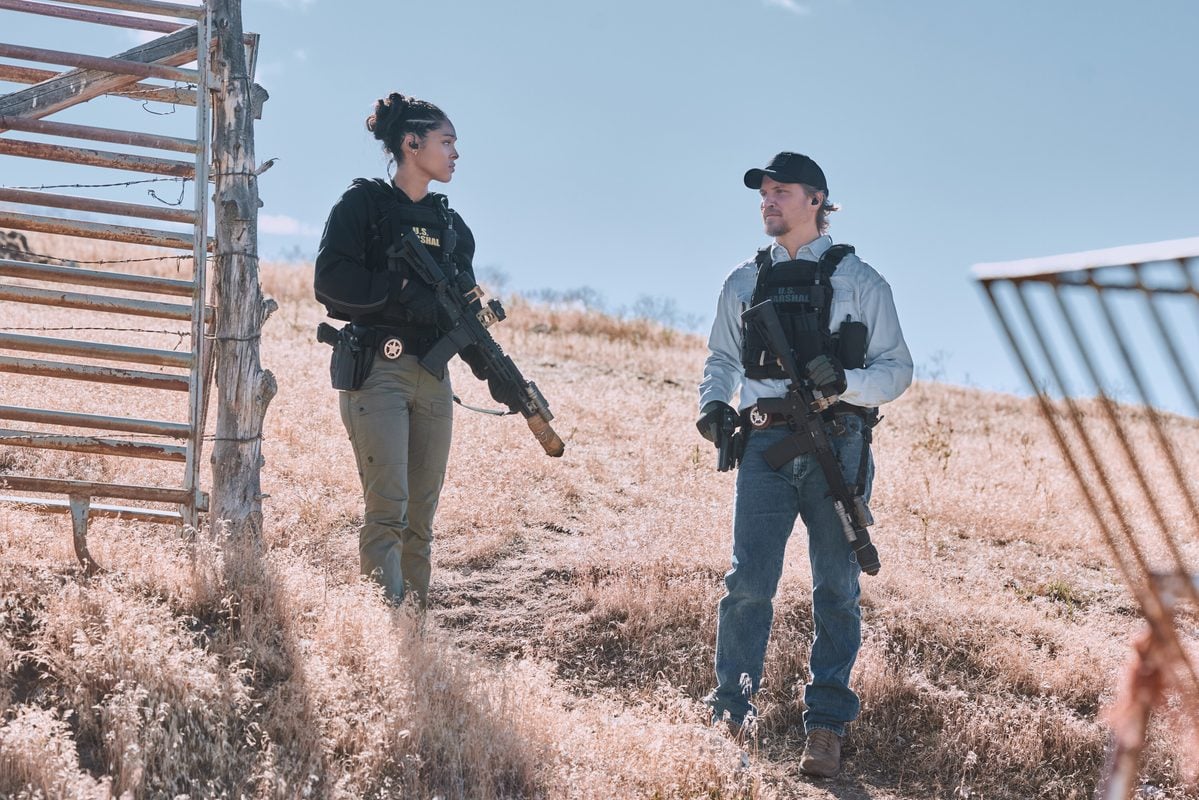 "Blast Radius" -- Coverage of the CBS Original Series Marshals, scheduled to air on the CBS Television Network.   Pictured (L-R): Ash Santos as Andrea Cruz and Luke Grimes as Kayce Dutton.  Photo: Fred Hayes/CBS ©2026 CBS Broadcasting, Inc. All Rights Reserved.