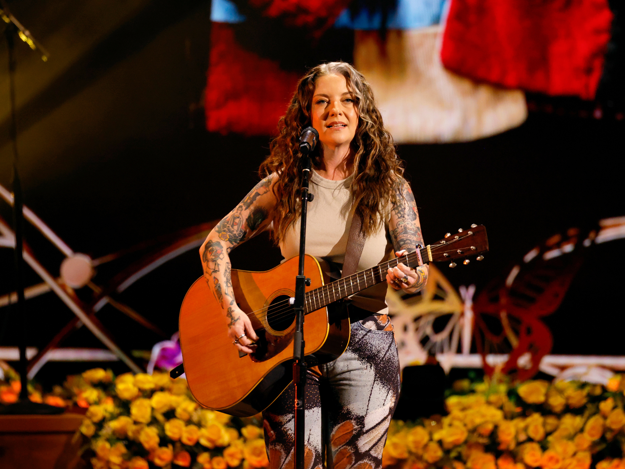 On Oct. 21, Ashley McBryde performed a powerful rendition of Dolly Parton's "Coat of Many Colors," honoring the late country icon as part of the "CMA Presents I Will Always Love You: A Celebration of Dolly Parton" televised tribute.