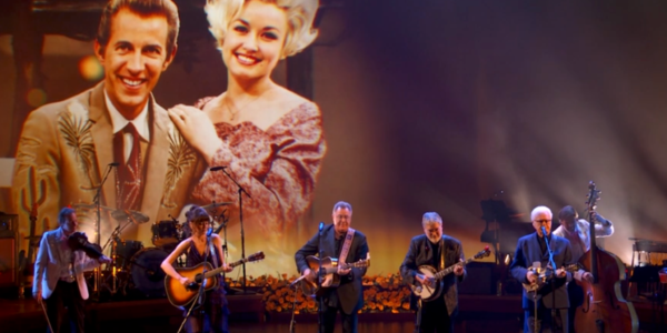 While the late Dolly Parton was known as the "Queen of Country," she also made a significant impact on folk music. Honoring that aspect of her career, artists Ricky Skaggs, Vince Gill, Molly Tuttle, and Béla Fleck were on hand for a special tribute performance.