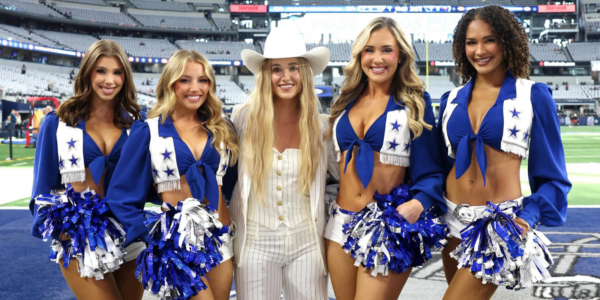 Lainey Wilson alongside the Dallas Cowboys Cheerleaders