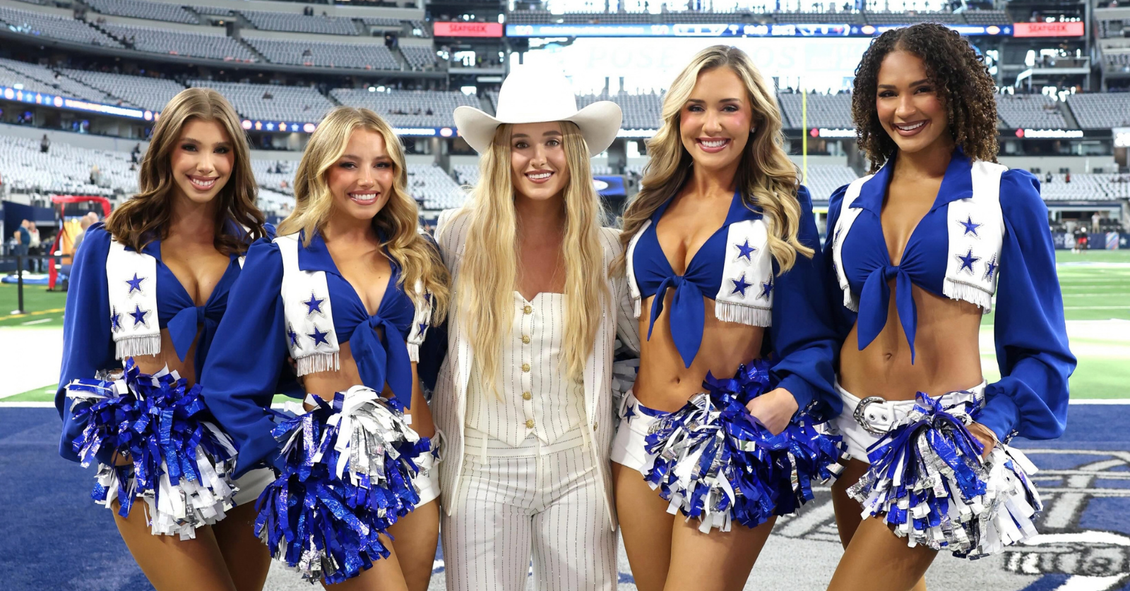 Lainey Wilson alongside the Dallas Cowboys Cheerleaders