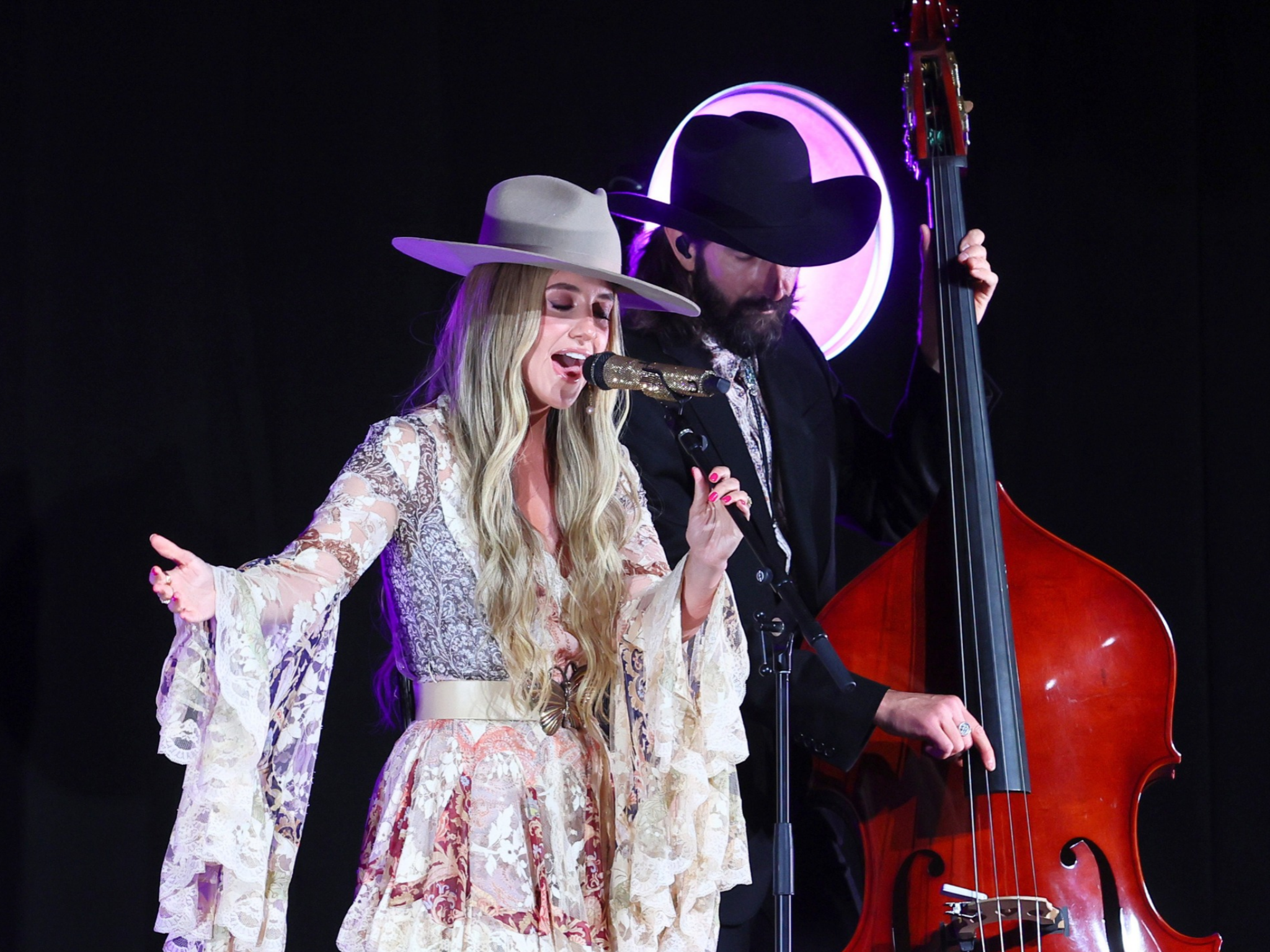 Lainey Wilson performs in honor of Taylor Swift at the Nashville Songwriter Hall of Fame induction ceremony