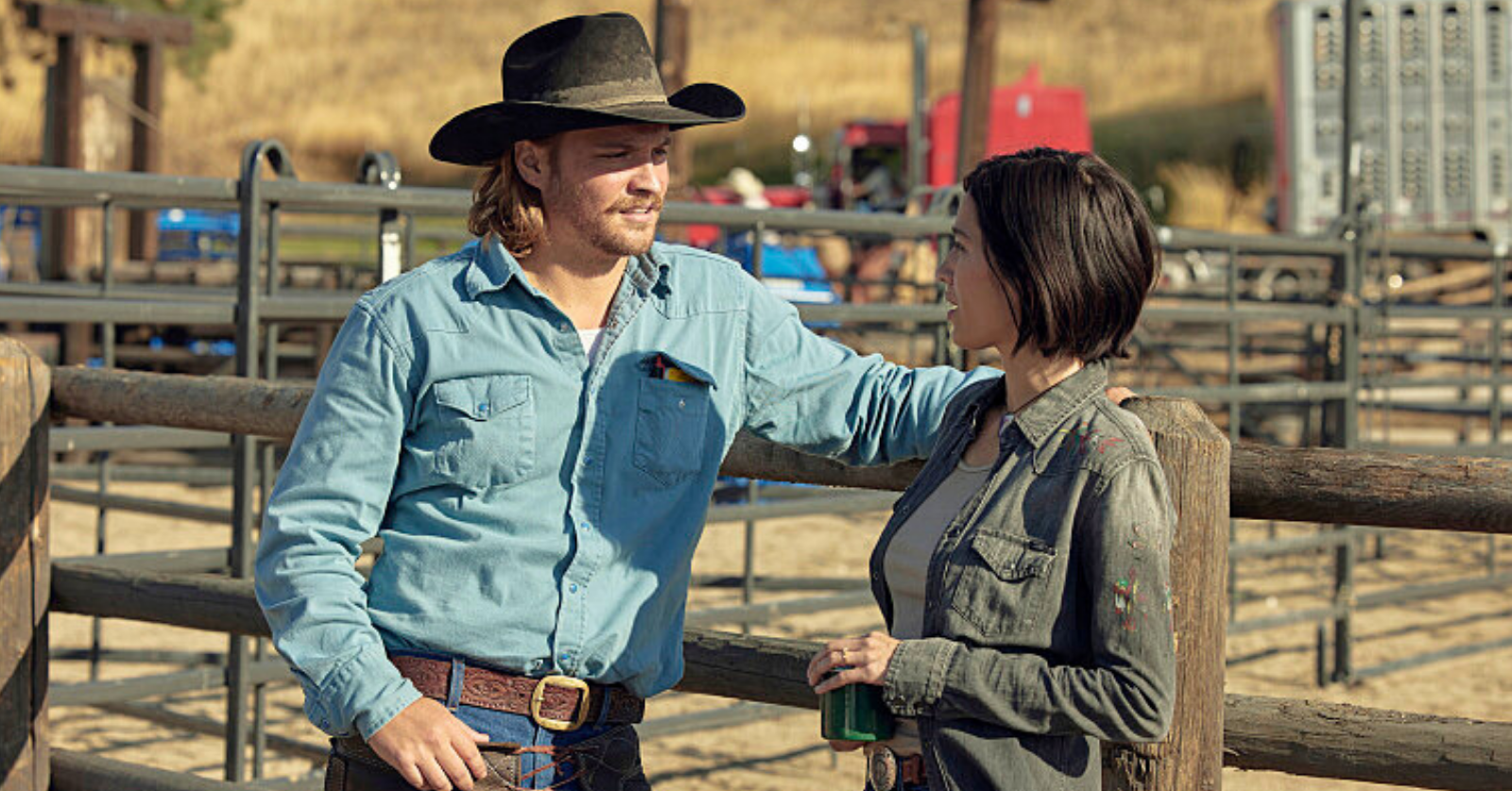 Luke Grimes as Kayce Dutton before Marshals and Kelsey Asbille as Monica Dutton, in a scene from Yellowstone